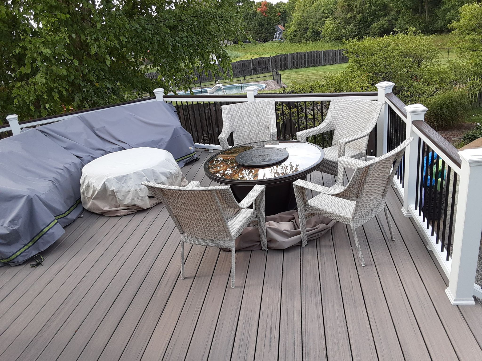 a completed deck with 4 chairs