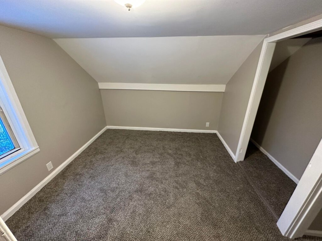 painted room with a carpet