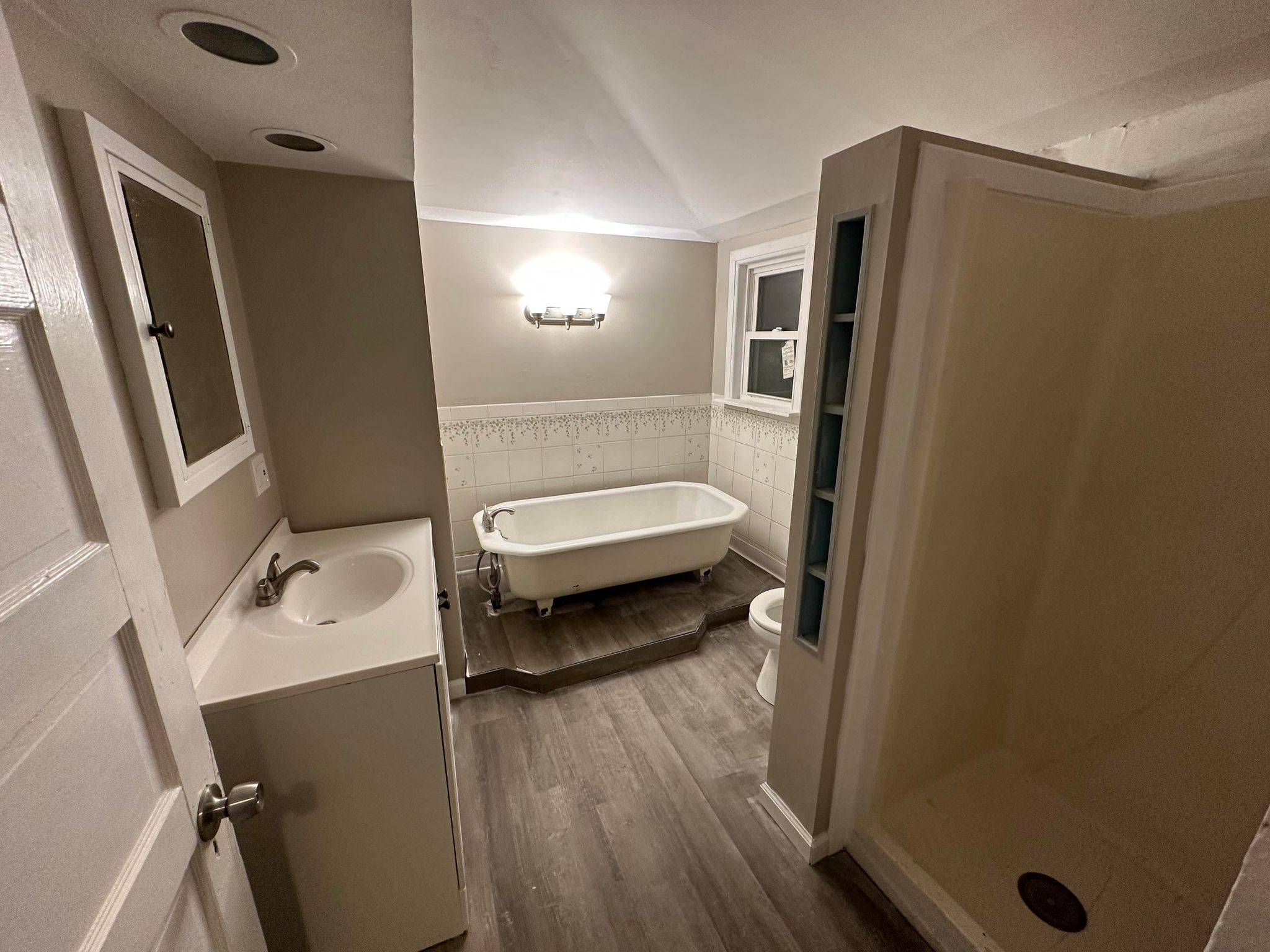 bathroom with wooden floor