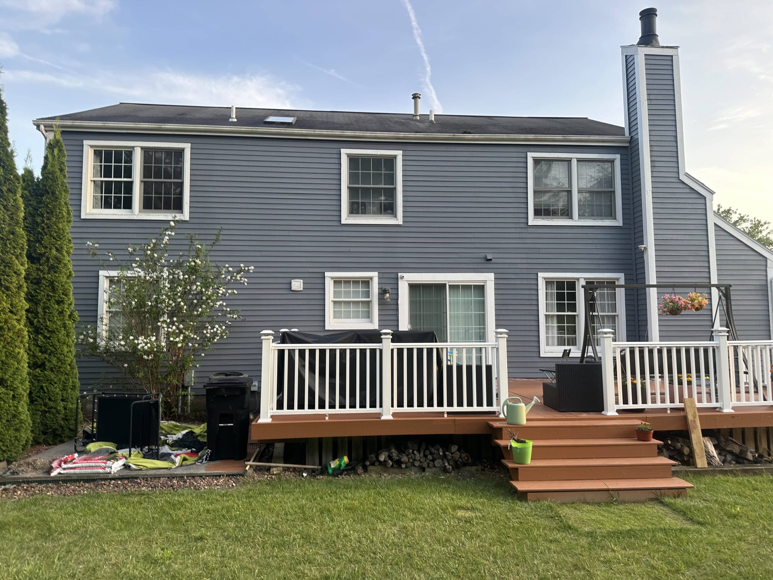 gray home with a garden