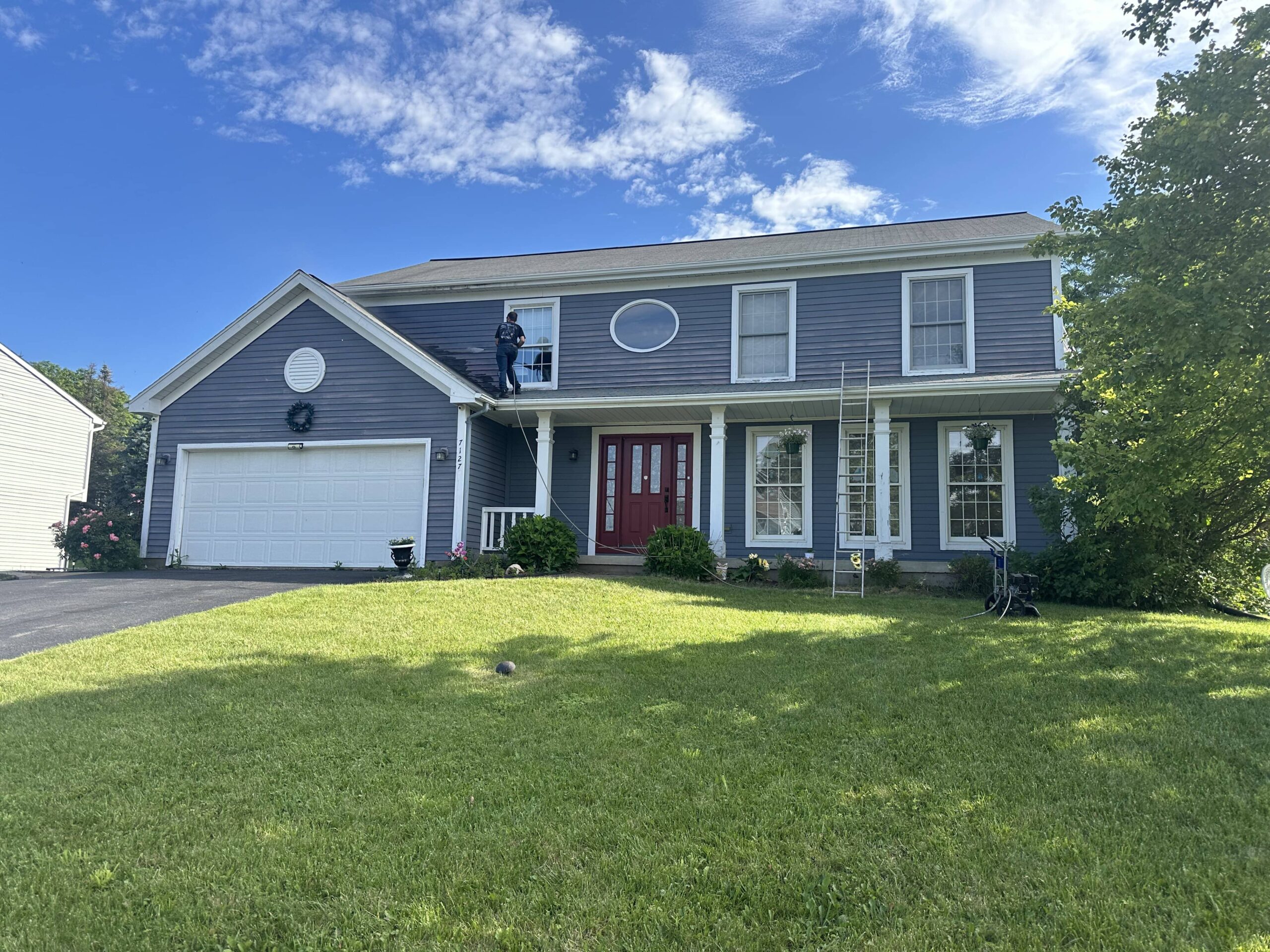 gray home with a garden