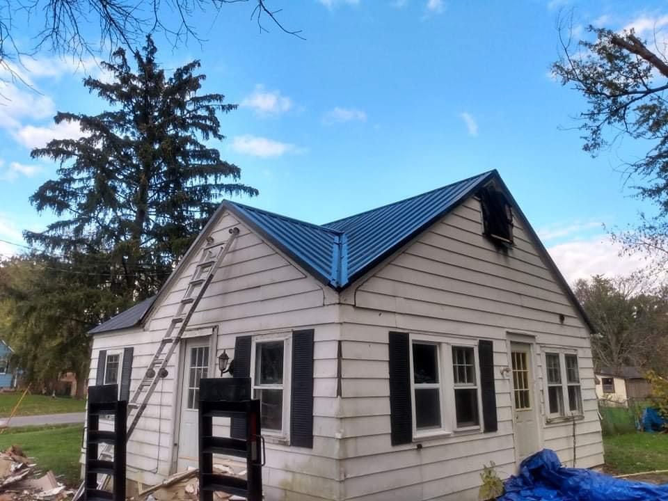 a white home with a ladder