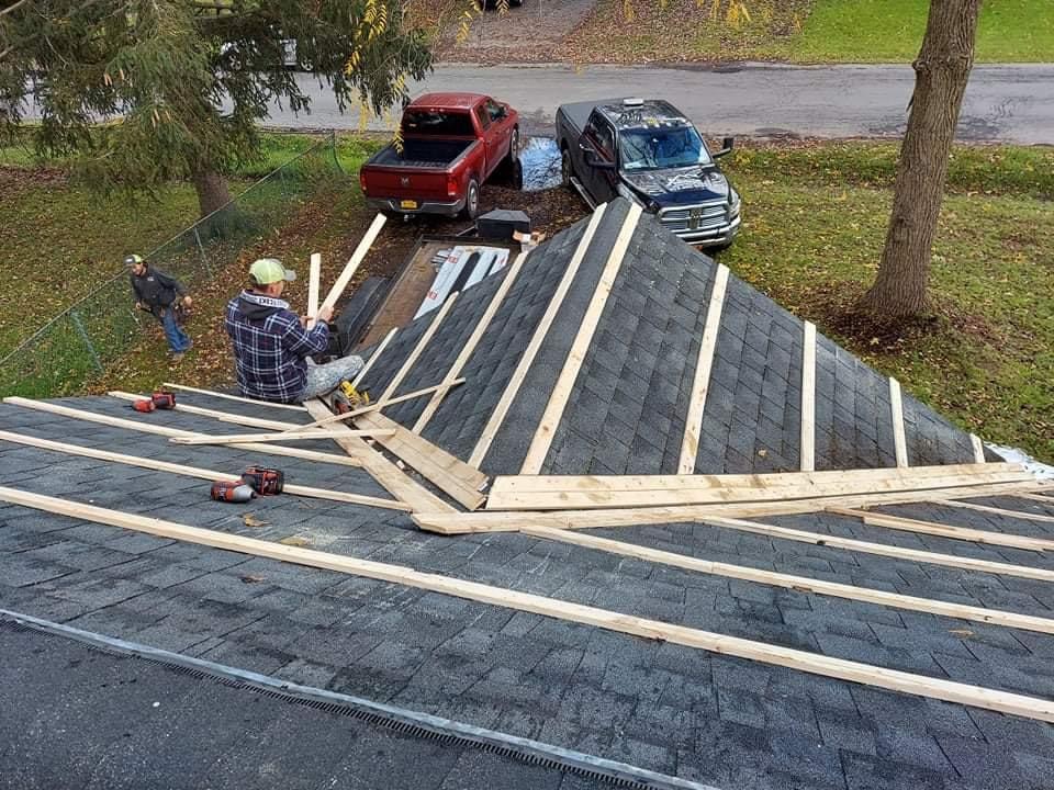 a man working on a roof